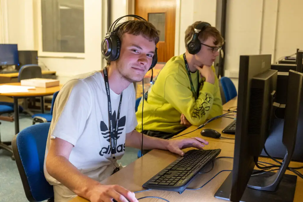 film and media production student working at computer