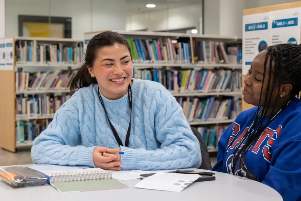 two students in the library