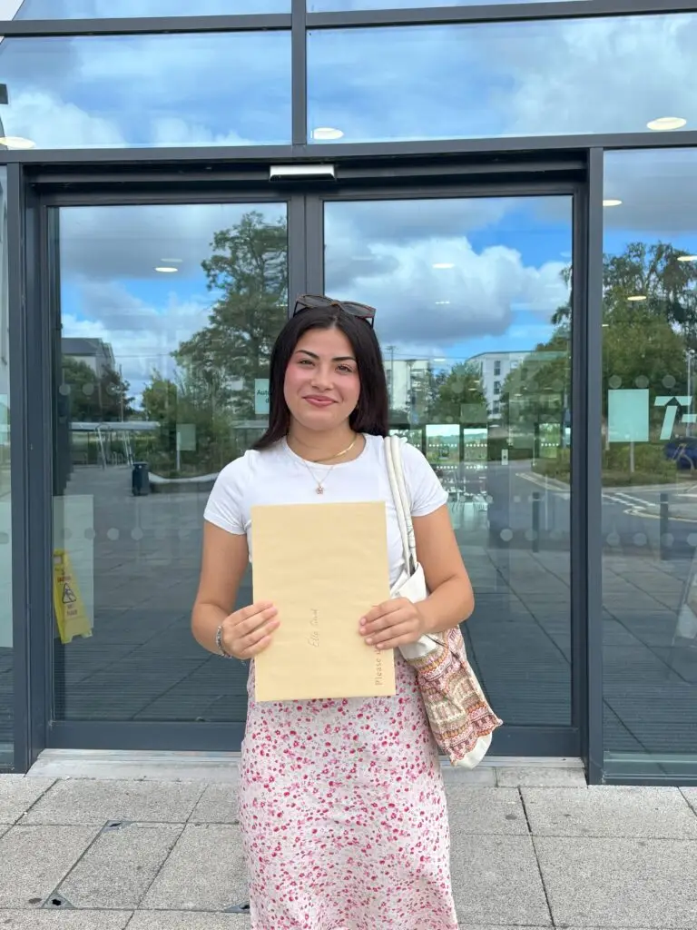 Engineering student Ella Gould holding successful T Level results