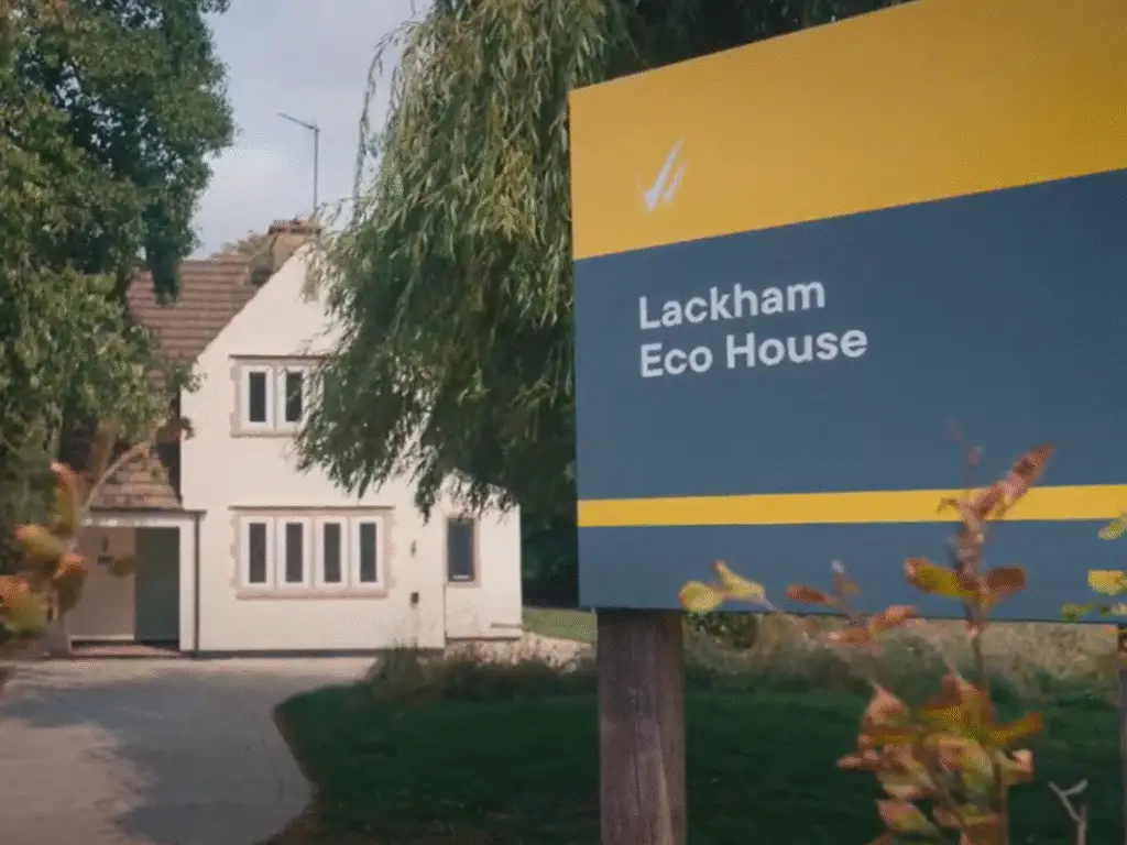 The Lackham Eco House with sign in the foreground.