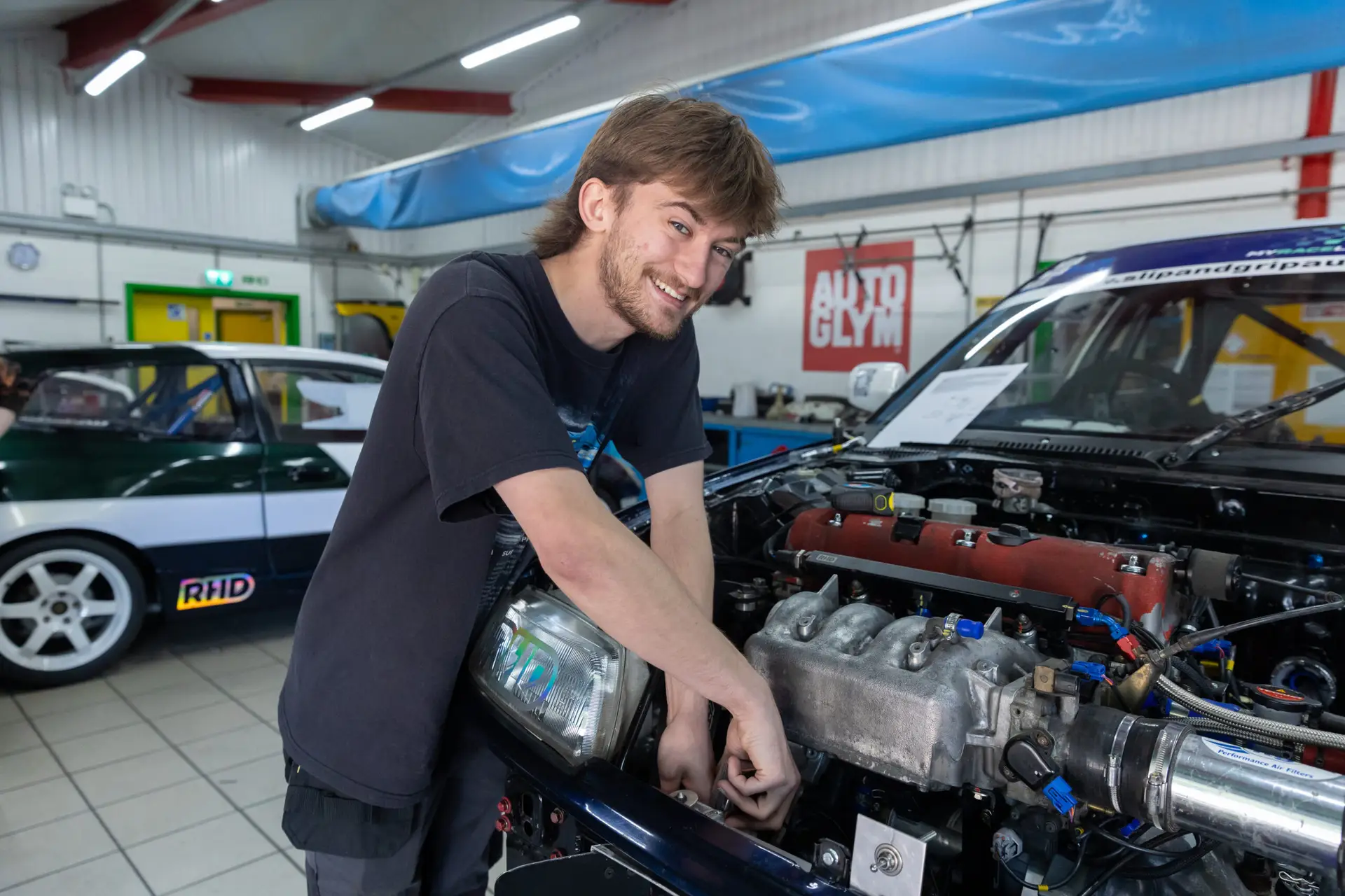 T Level student working on a car