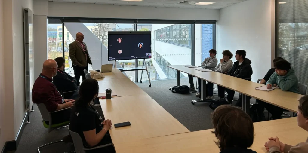Engineering students and staff attend a Babcock presentation in a classroom at Wiltshire College & University Centre.