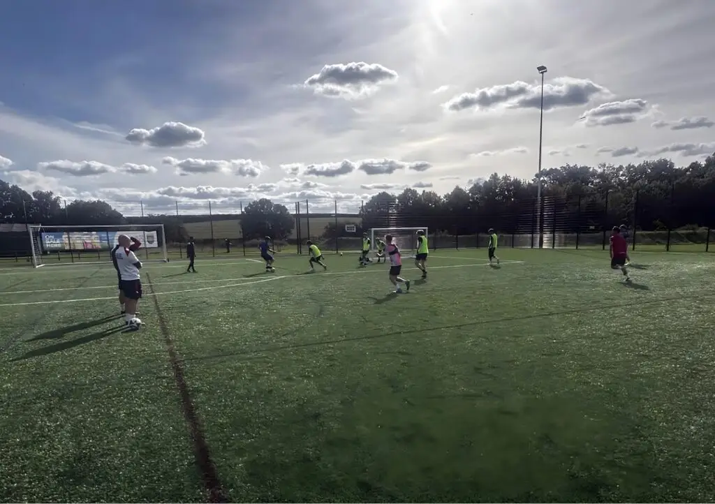 Wiltshire College football academy players taking part in a match on a 3G pitch.