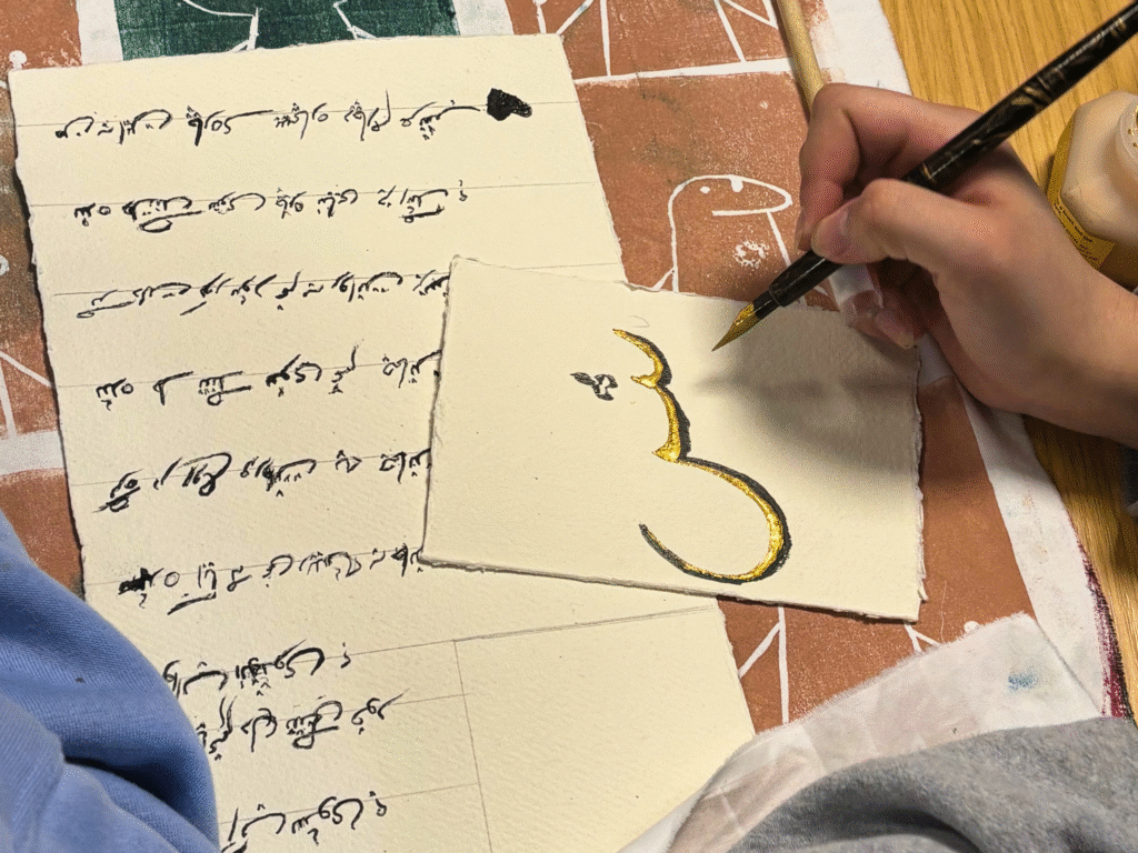 Detailed art work and letters created by ESOL students