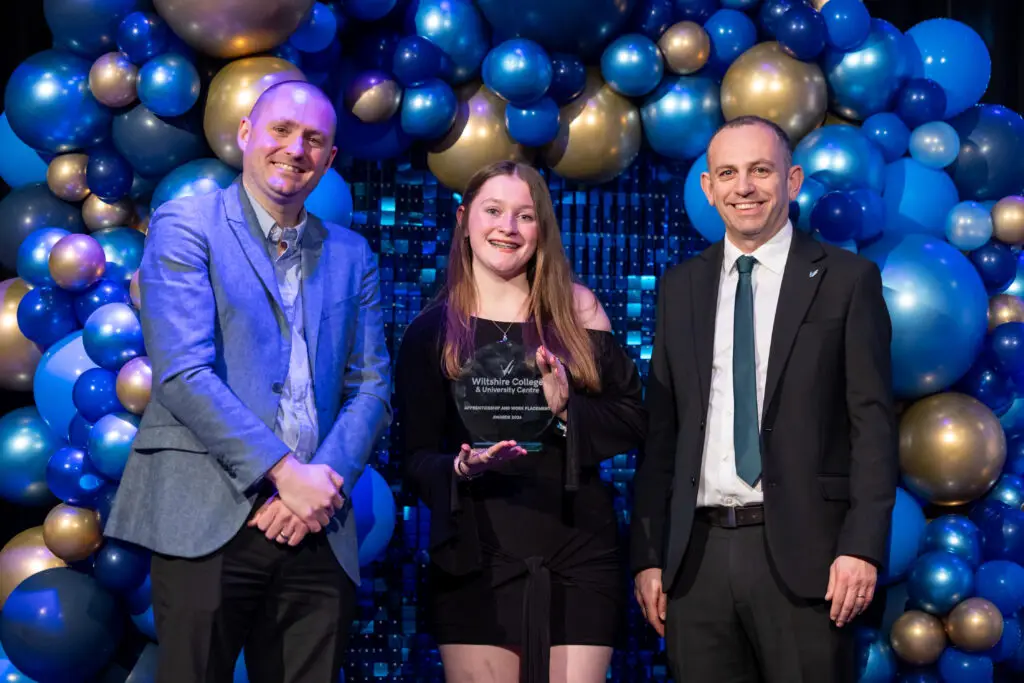 Apprentices, students and employers on stage at Wiltshire College & University Centre’s Apprenticeship and Work Placement Awards at Trowbridge Civic Centre.