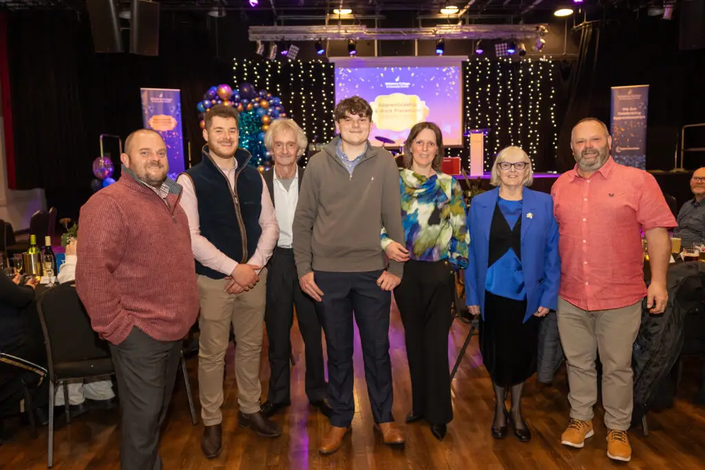 Apprentices, students and employers on stage at Wiltshire College & University Centre’s Apprenticeship and Work Placement Awards at Trowbridge Civic Centre.