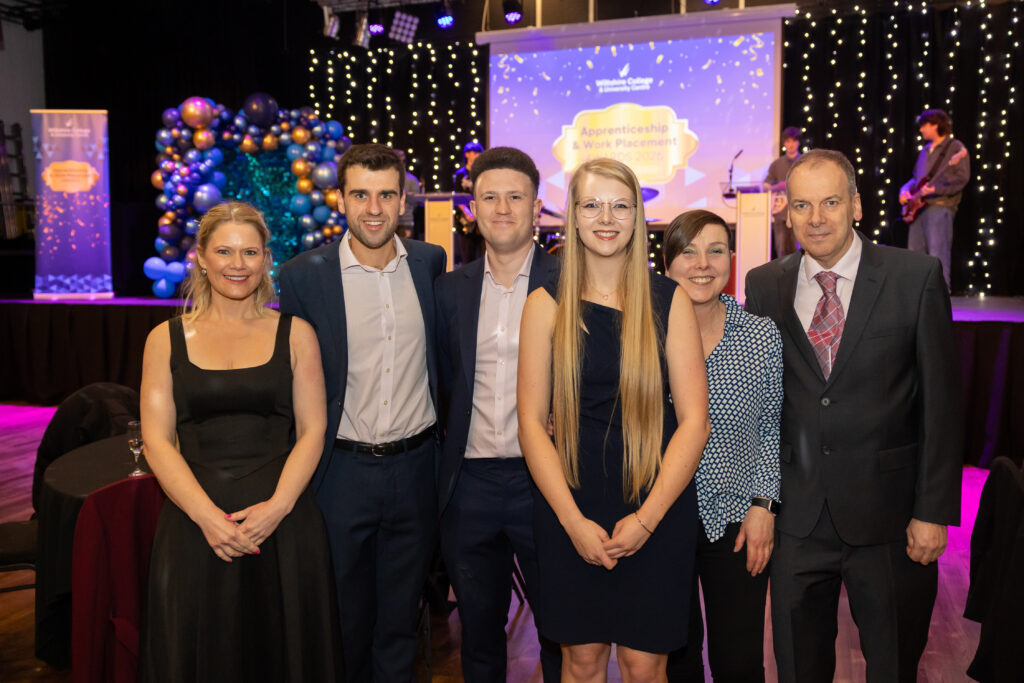 Apprentices, students and employers on stage at Wiltshire College & University Centre’s Apprenticeship and Work Placement Awards at Trowbridge Civic Centre.