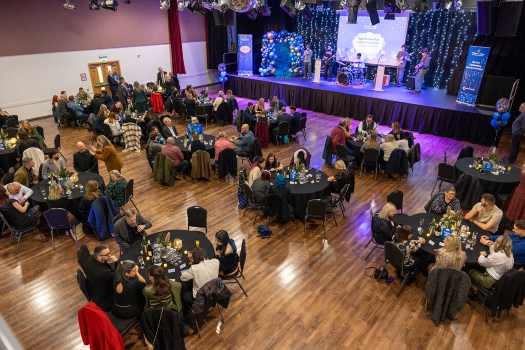 Apprentices, students and employers on stage at Wiltshire College & University Centre’s Apprenticeship and Work Placement Awards at Trowbridge Civic Centre.