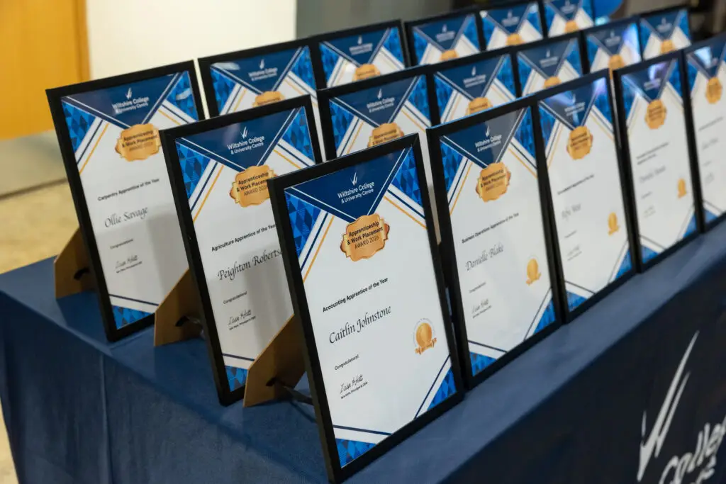 Apprentices, students and employers on stage at Wiltshire College & University Centre’s Apprenticeship and Work Placement Awards at Trowbridge Civic Centre.
