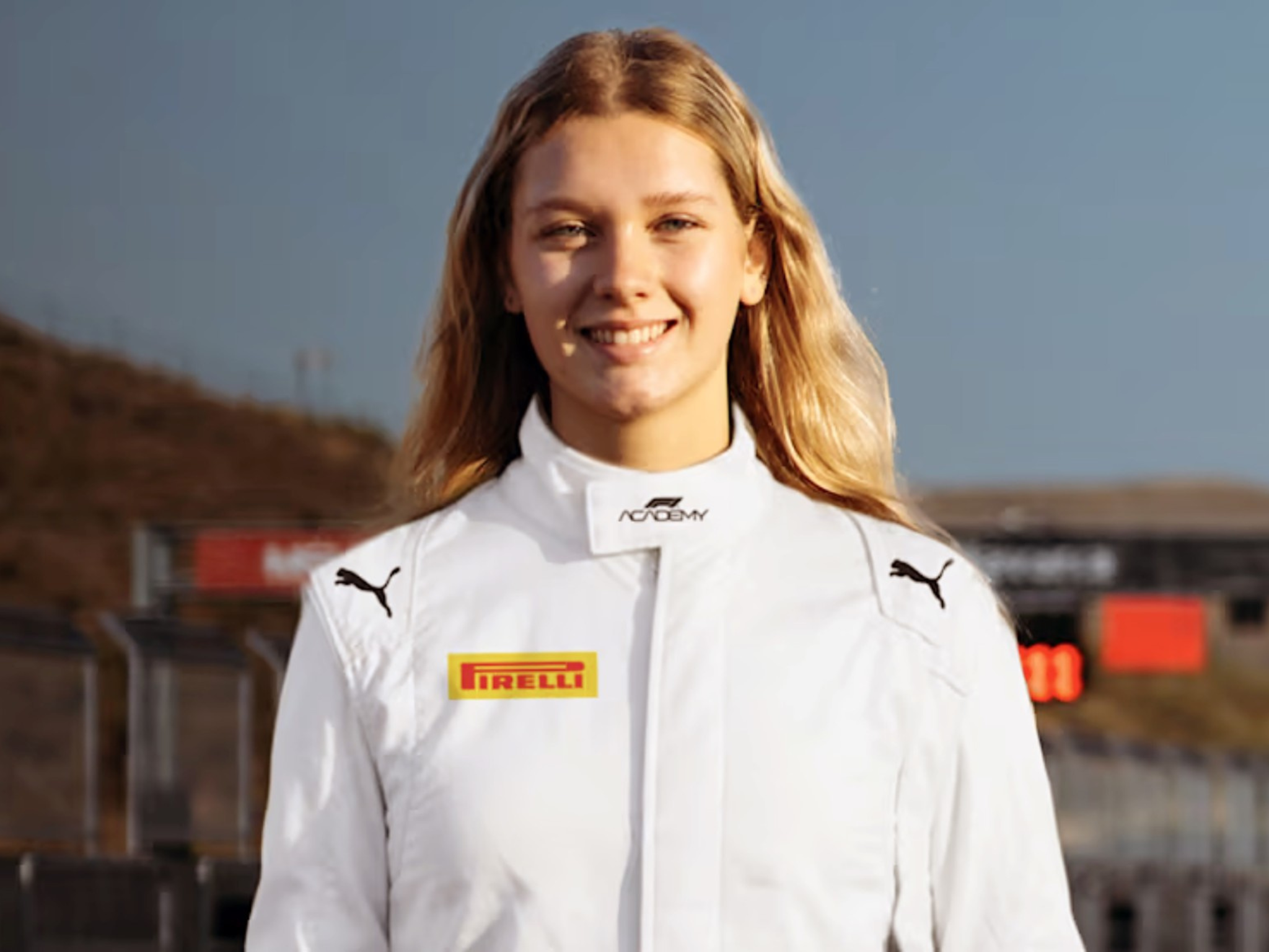 Portrait of female student in racing hear
