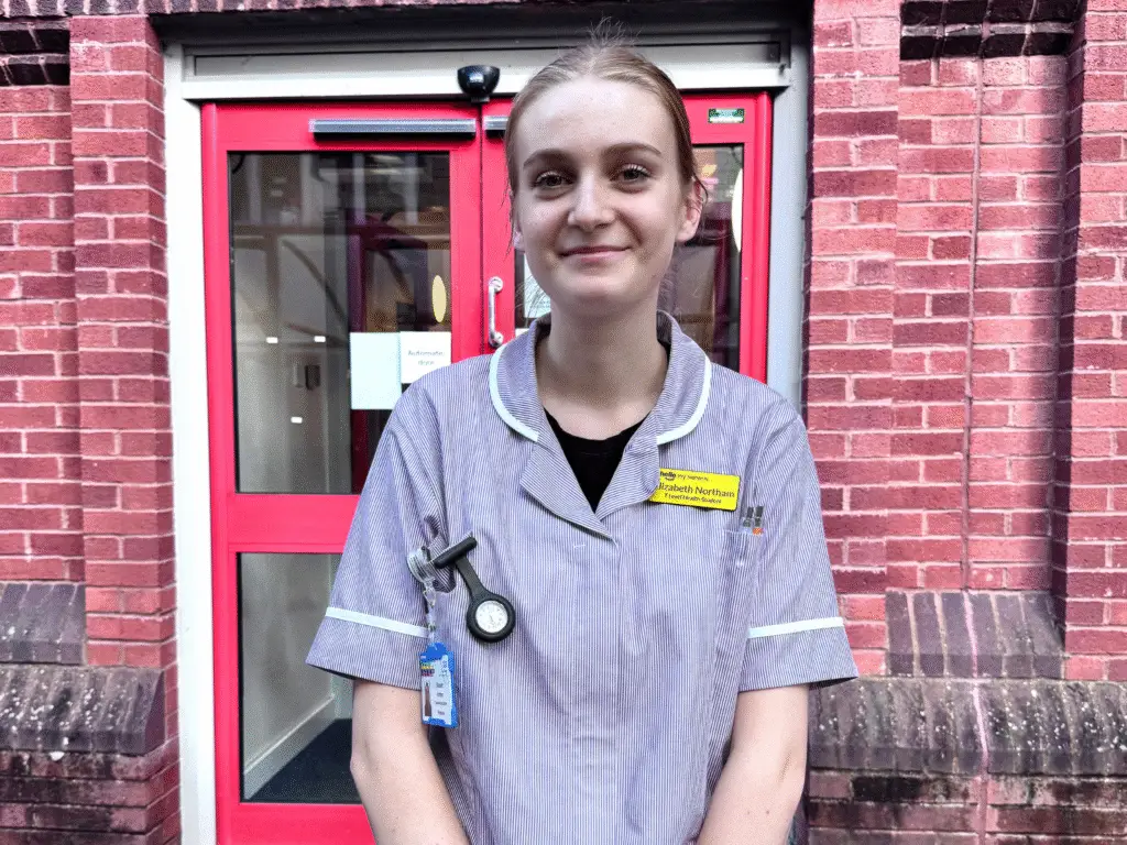 Student outside the dermatology ward at the hospital
