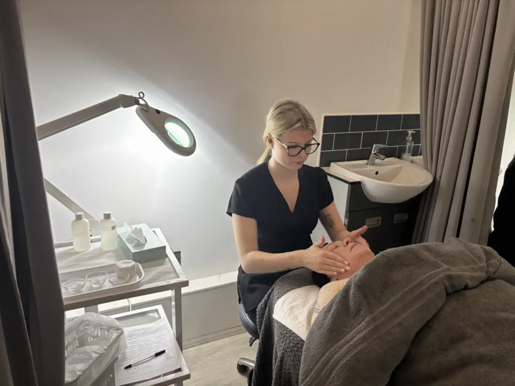 Unpaid carer receiving a facial by a student