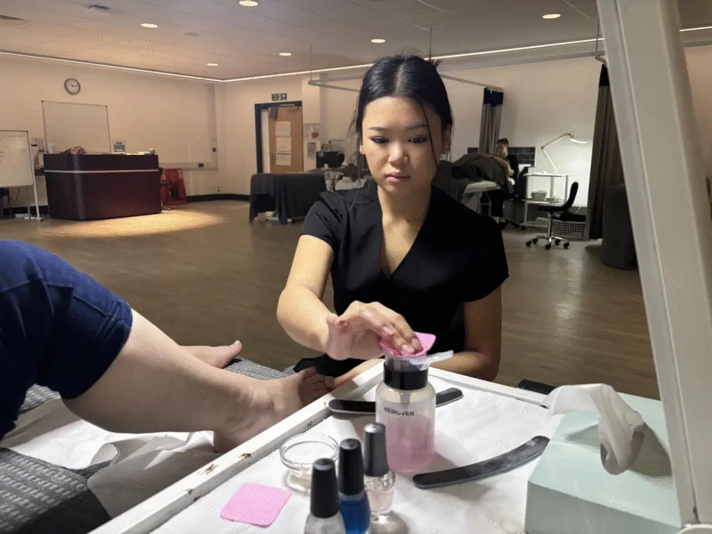 student doing a pedicure