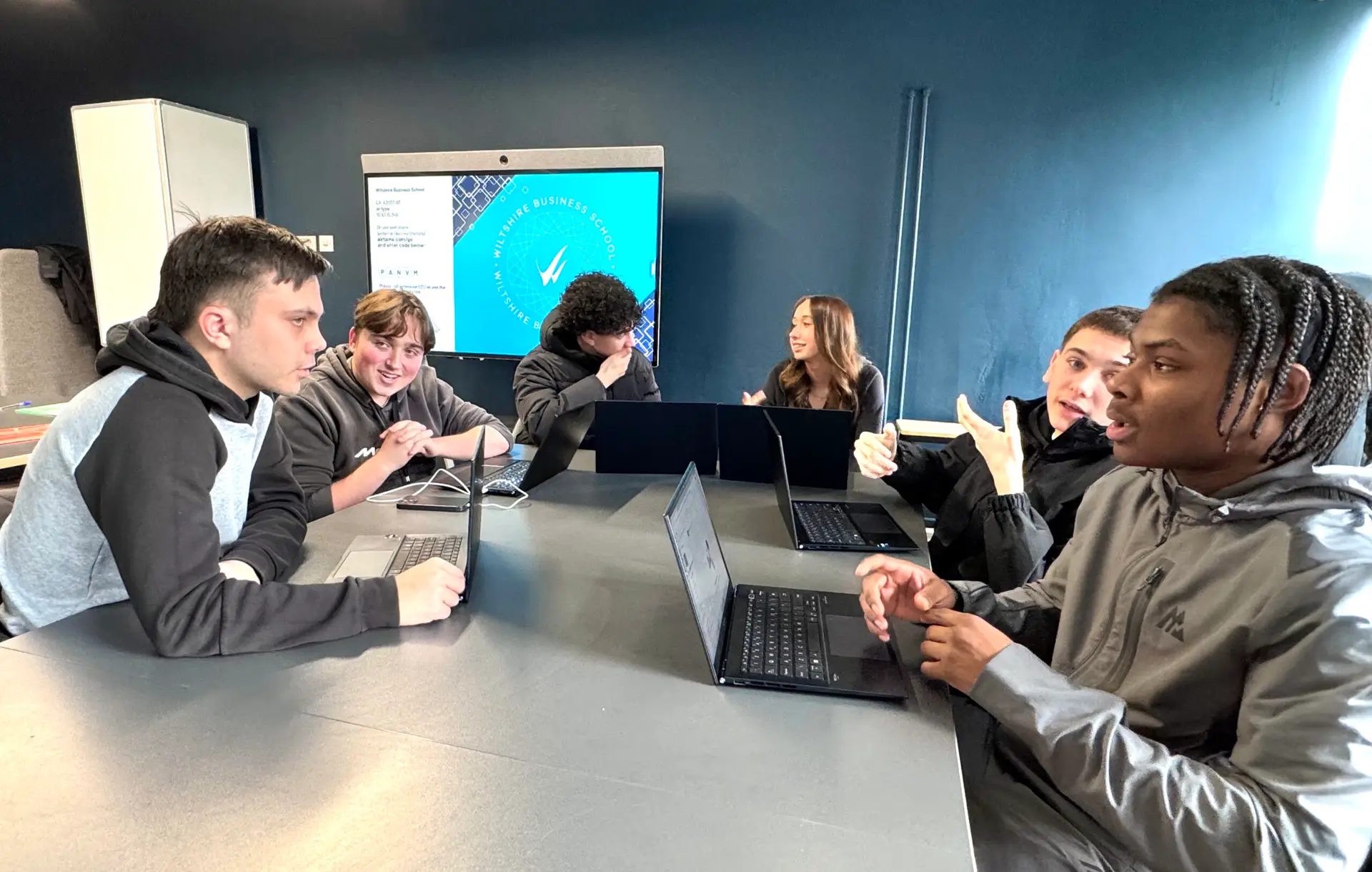 T Level Management and Administration students swapping ideas at the Wiltshire Business School