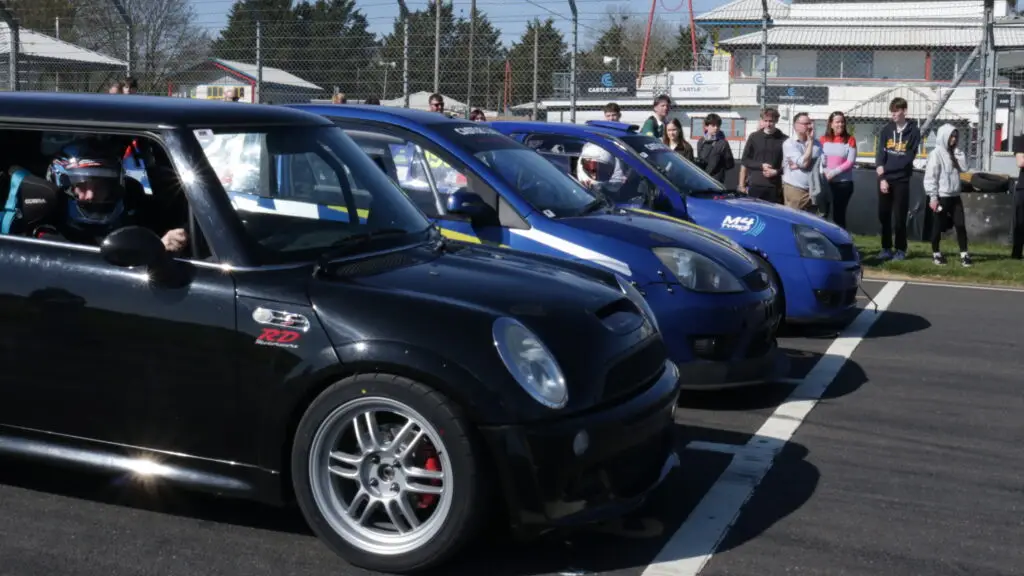 Cars lined up on the track