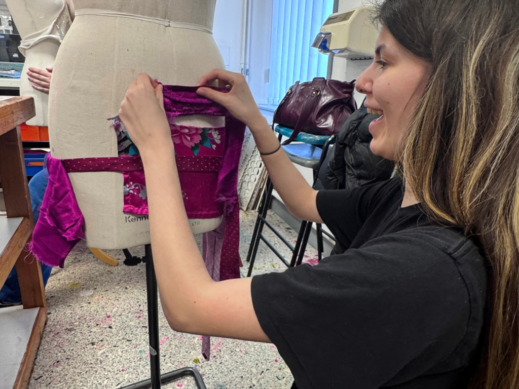 Fashion student from Wiltshire College & University Centre working on a garment.