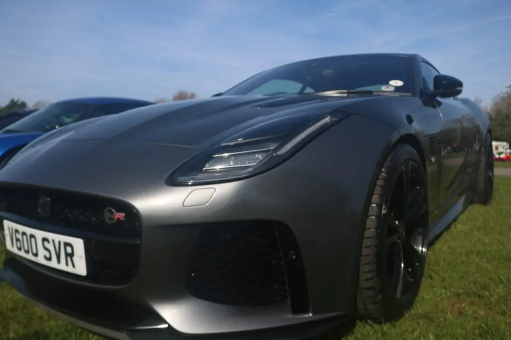 A close up of the bonnet of a grey jaguar