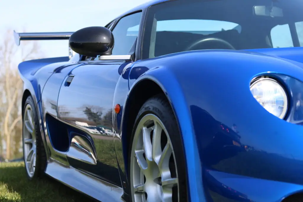 A close up of a blue car