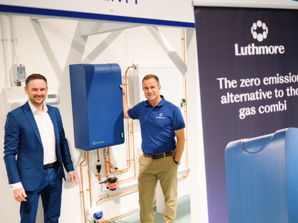 Wiltshire College Commercial Manager and CEO of Luthmore stand by the Luthmore One boiler.