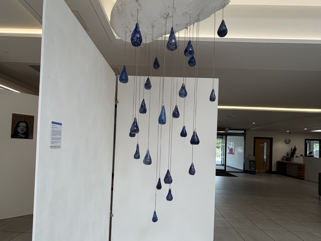 art work - of a cloud with rain 