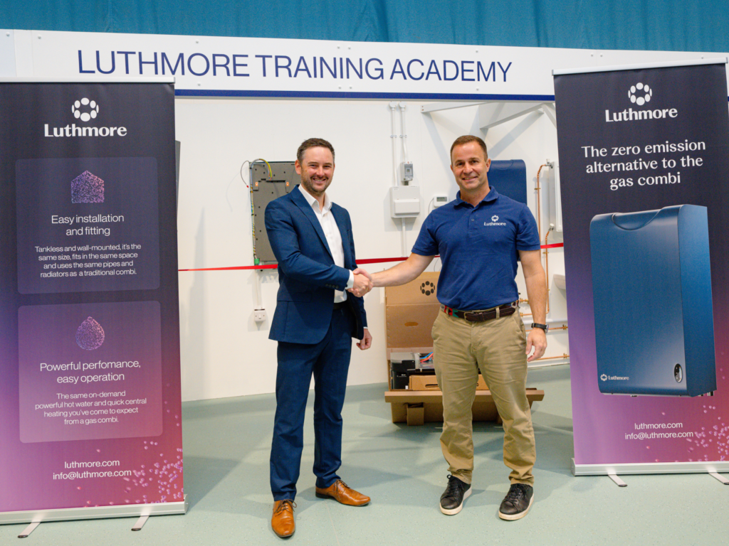 Wiltshire College Commercial Manager and CEO of Luthmore shake hands ahead of the ribbon cutting at the Luthmore Training Academy.