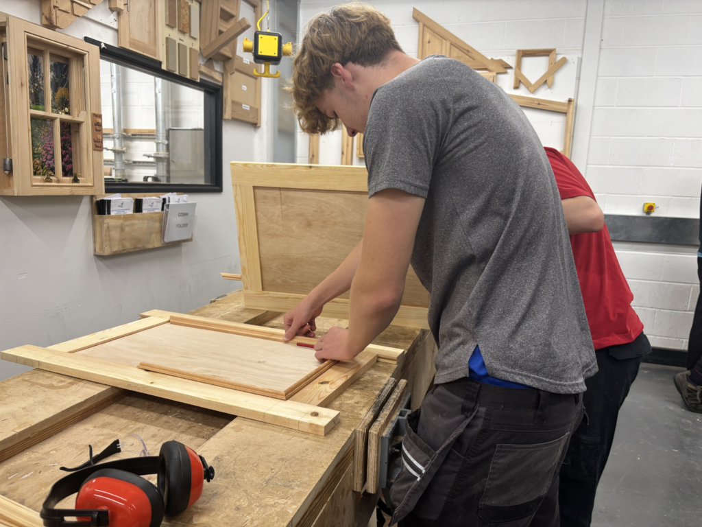 Joinery students working on cupboard doors during the College's Construction Skills Competition.