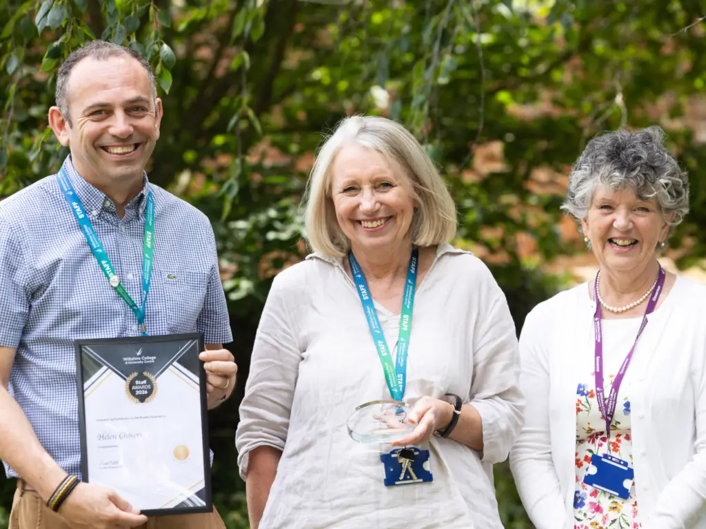 Wiltshire College presents award to staff member at their annual awards day.