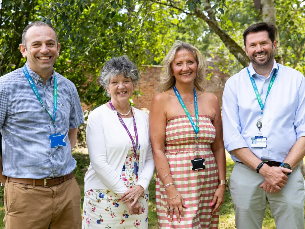 Vice Chair of Governors and Senior Leadership team members at Wiltshire College present staff with awards.