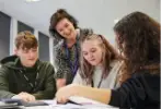 student on project discussion