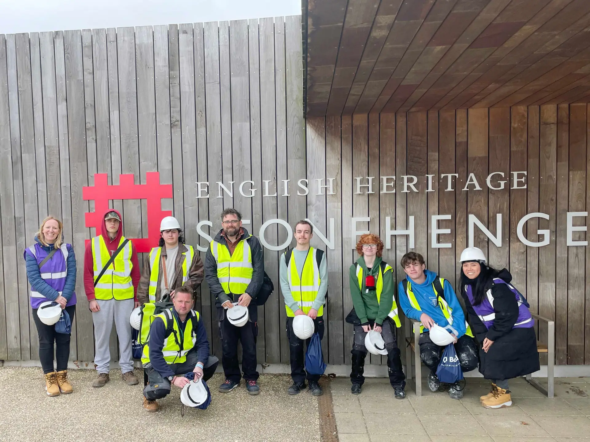 Carpentry and joinery students and staff from Wiltshire College & University Centre at Stonehenge and trying their hand at wattle and daub and hurdle making