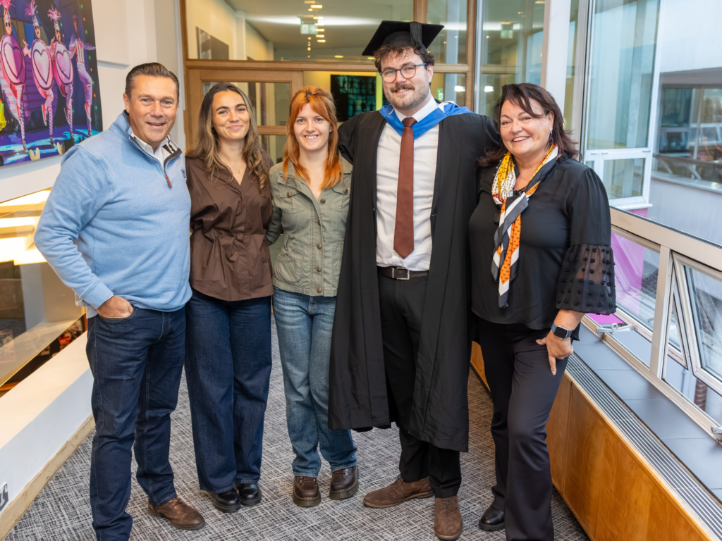 A graduand with family members 