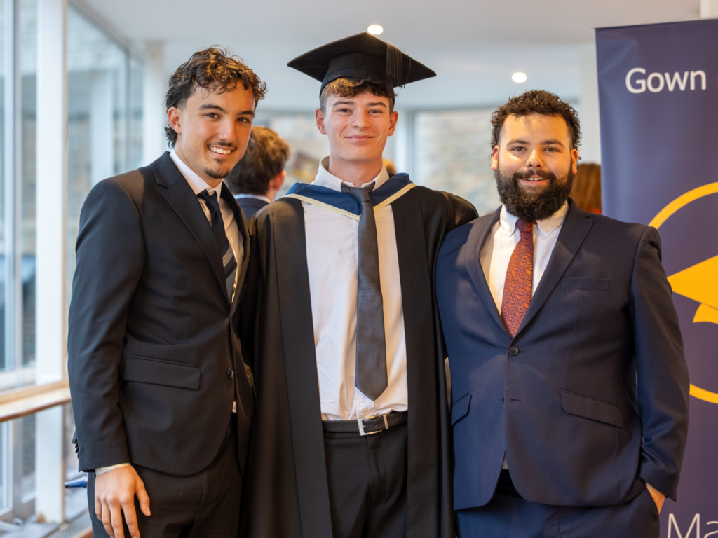 A graduand with friends and family 
