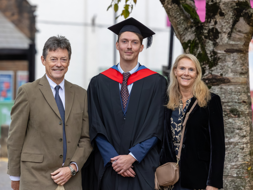 A graduand with family members 