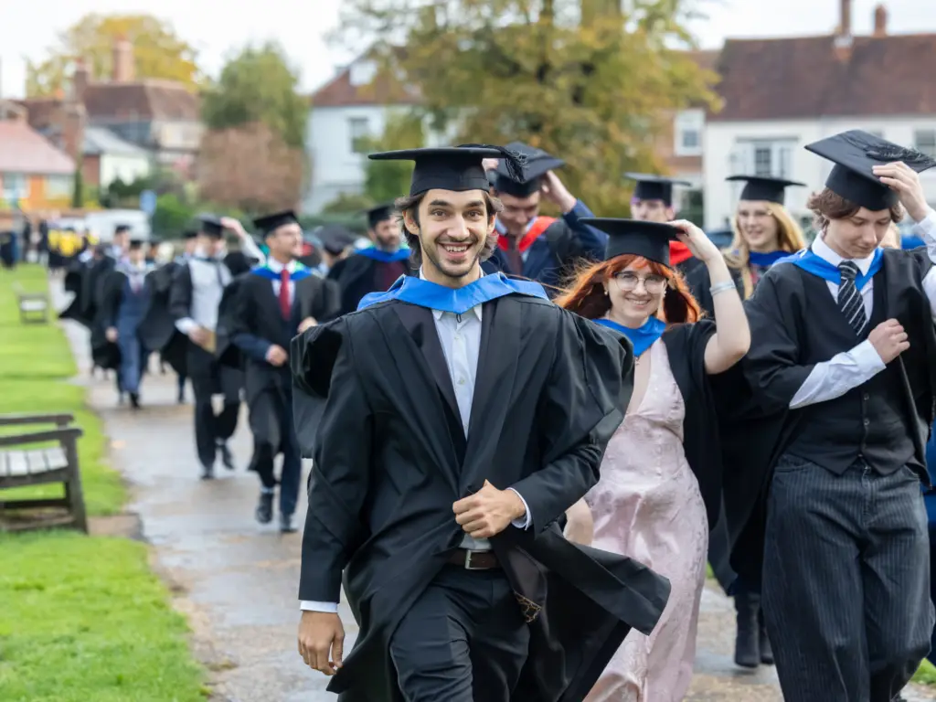 Graduands walking to Salisbury cathedral