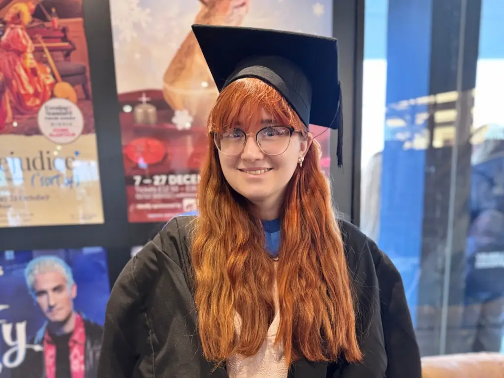 Graduate Joanna celebrating her degree in Bachelor of Arts in Film Production and Cinematography