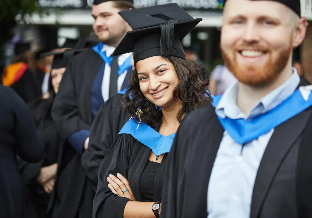 university student in her robe and gown